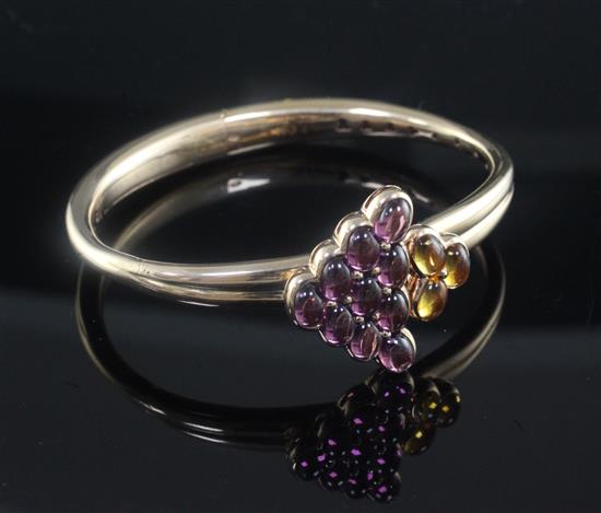 A 20th century French Maubusson 18ct gold and gem set hinged bangle,